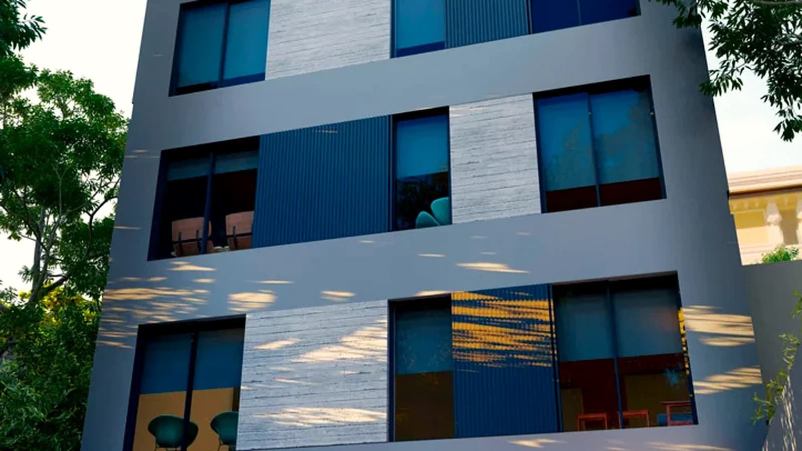 Edificio multifamiliar terminado, de varios niveles, con fachada de vidrio y balcones